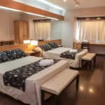 Hotel Hathor camas dobles con toallas