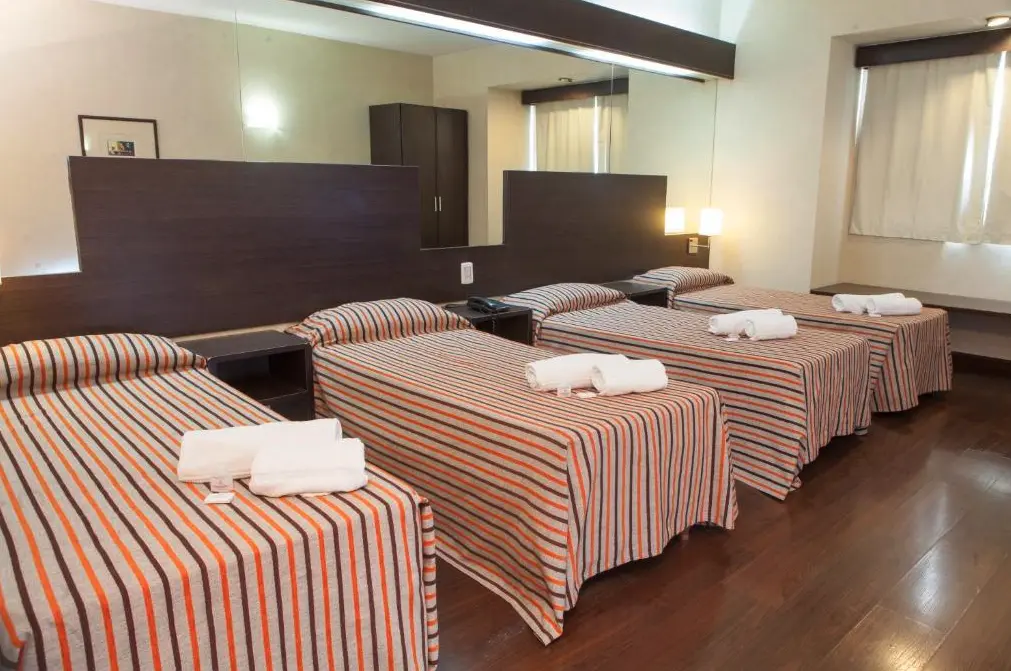 Hotel Hathor camas individuales con toallas