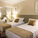 Hotel Huentala camas individuales