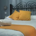 Hotel Sienna cama doble con toallas