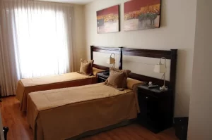 Hotel Villaggio camas individuales