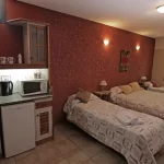 Hotel Xumec habitación cuádruple