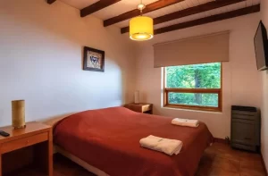 Aparthotel Manke cama doble con toallas