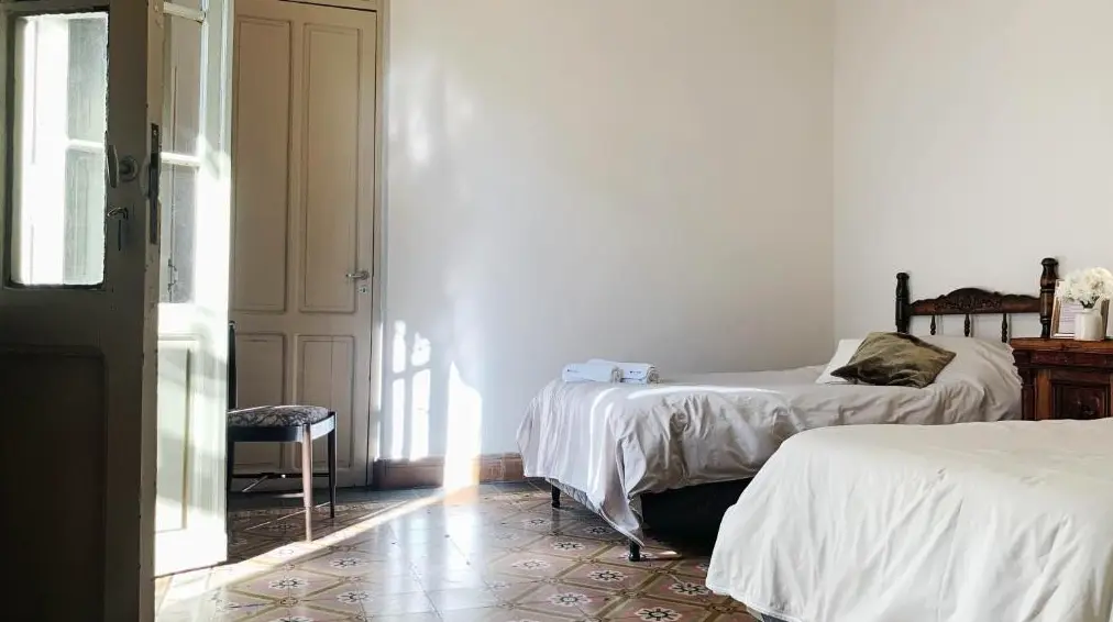 Casa Alem Colonial camas individuales con toallas