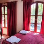 Departamentos Azul cama doble con toallas