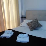 Departamentos El Ceibo cama doble con toallas