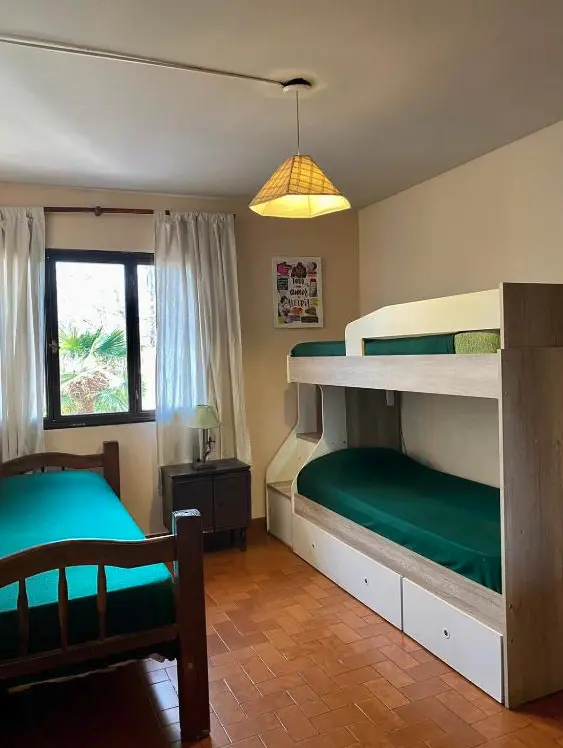 Hostel Open House cama individual y cucheta