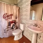 Hostel Open House espejo del baño