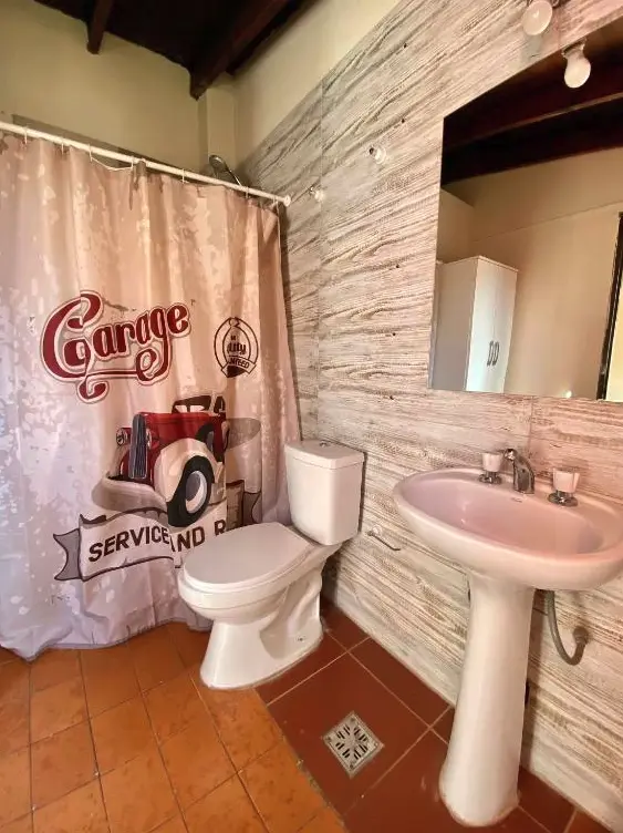 Hostel Open House espejo del baño